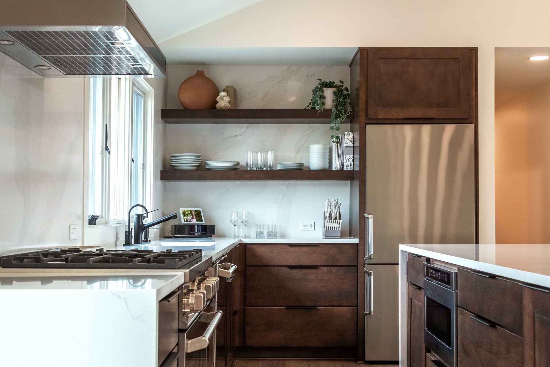 Modern kitchen interior with wooden furniture. Kitchen with stainless steel appliances