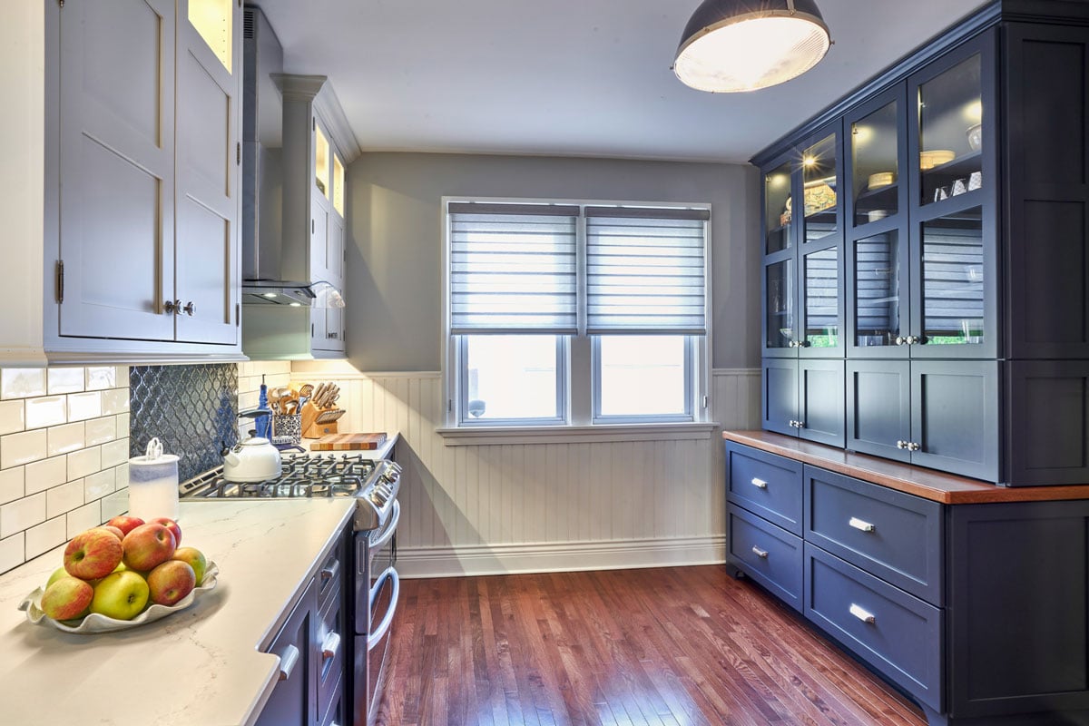 Kitchen interior with fruit bowl on countertop. Modern kitchen design.