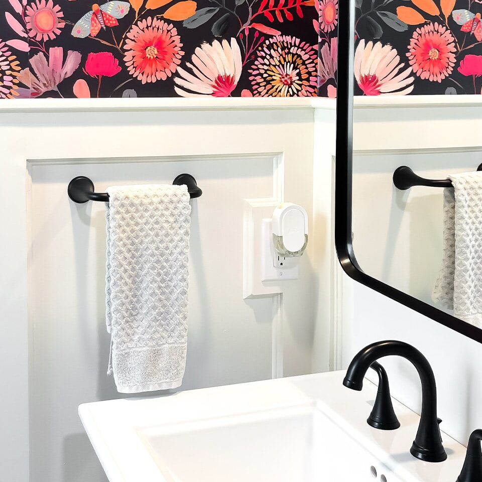 Bathroom interior with floral design. Modern bathroom sink.